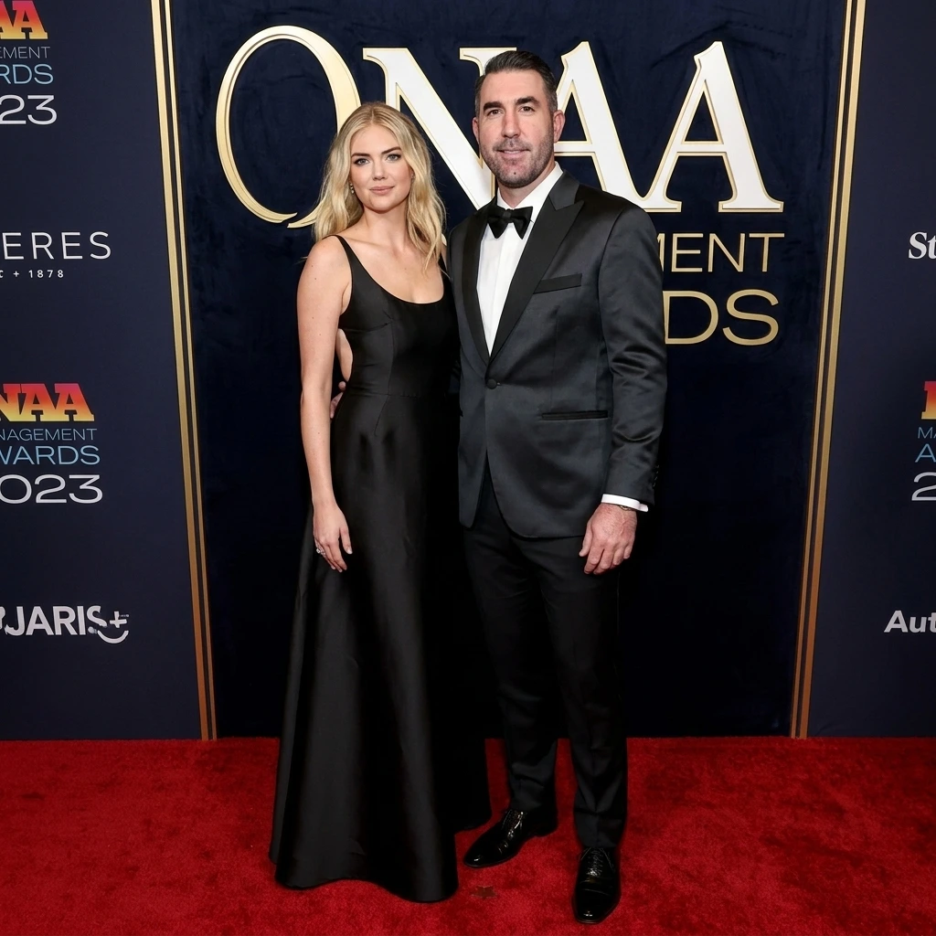 Model Kate Upton and MLB pitcher Justin Verlander holding hands.