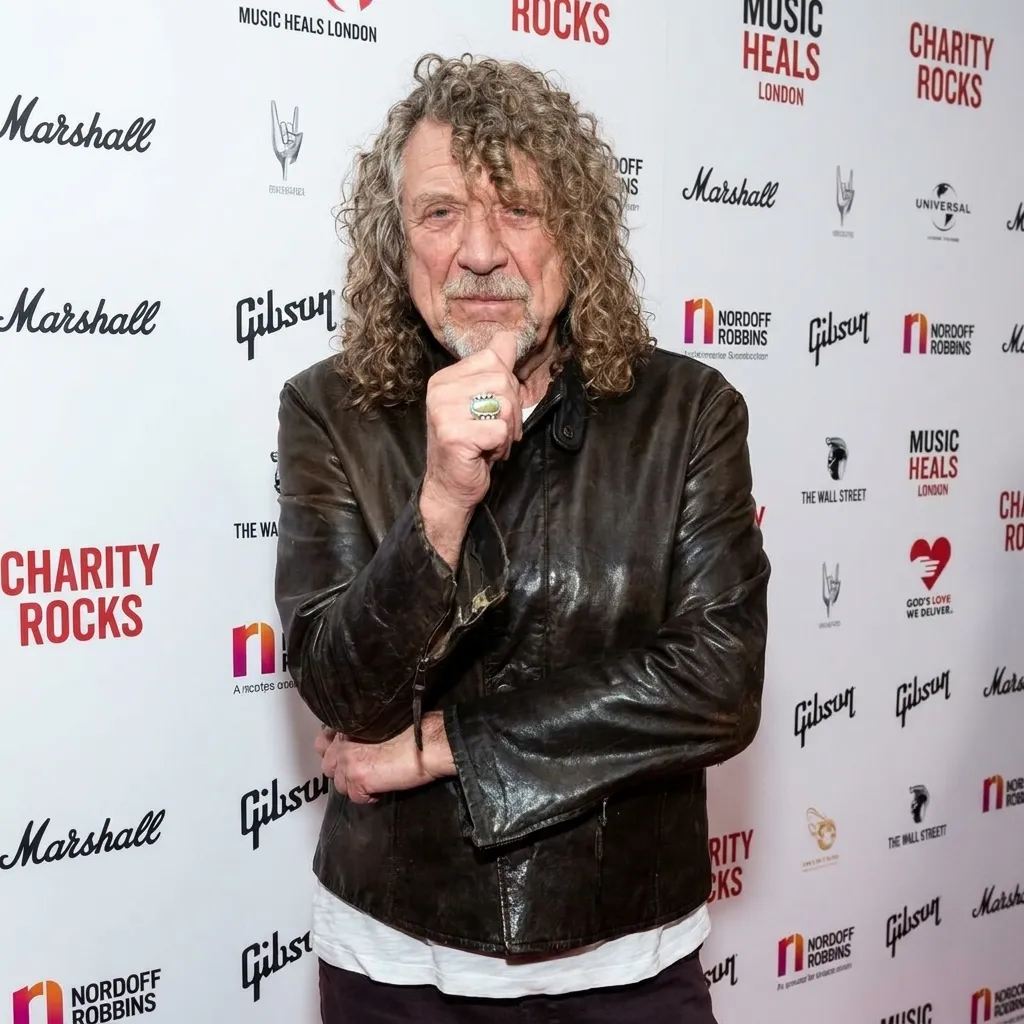 Robert Plant of Led Zeppelin attending the Charity Rocks Music Heals London event wearing a brown leather jacket