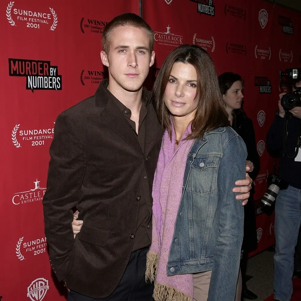 Ryan Gosling and Sandra Bullock posing together at the Murder by Numbers premiere at the 2001 Sundance Film Festival.