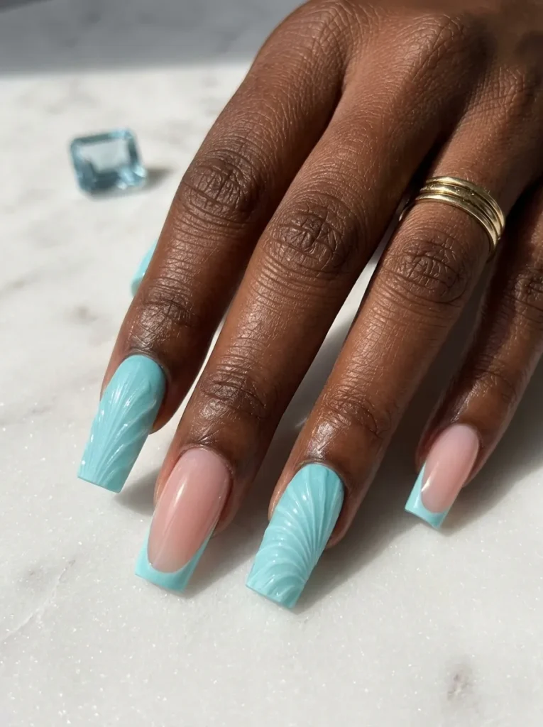 long-square-nails-icy-turquoise-textured-shell-design-and-french-tips